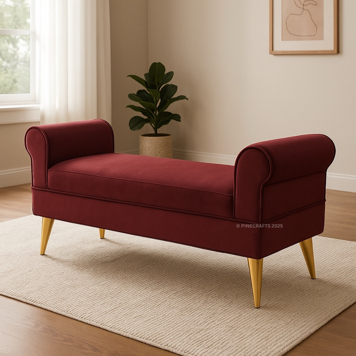 Maroon bench with gold legs in a room with a plant and window